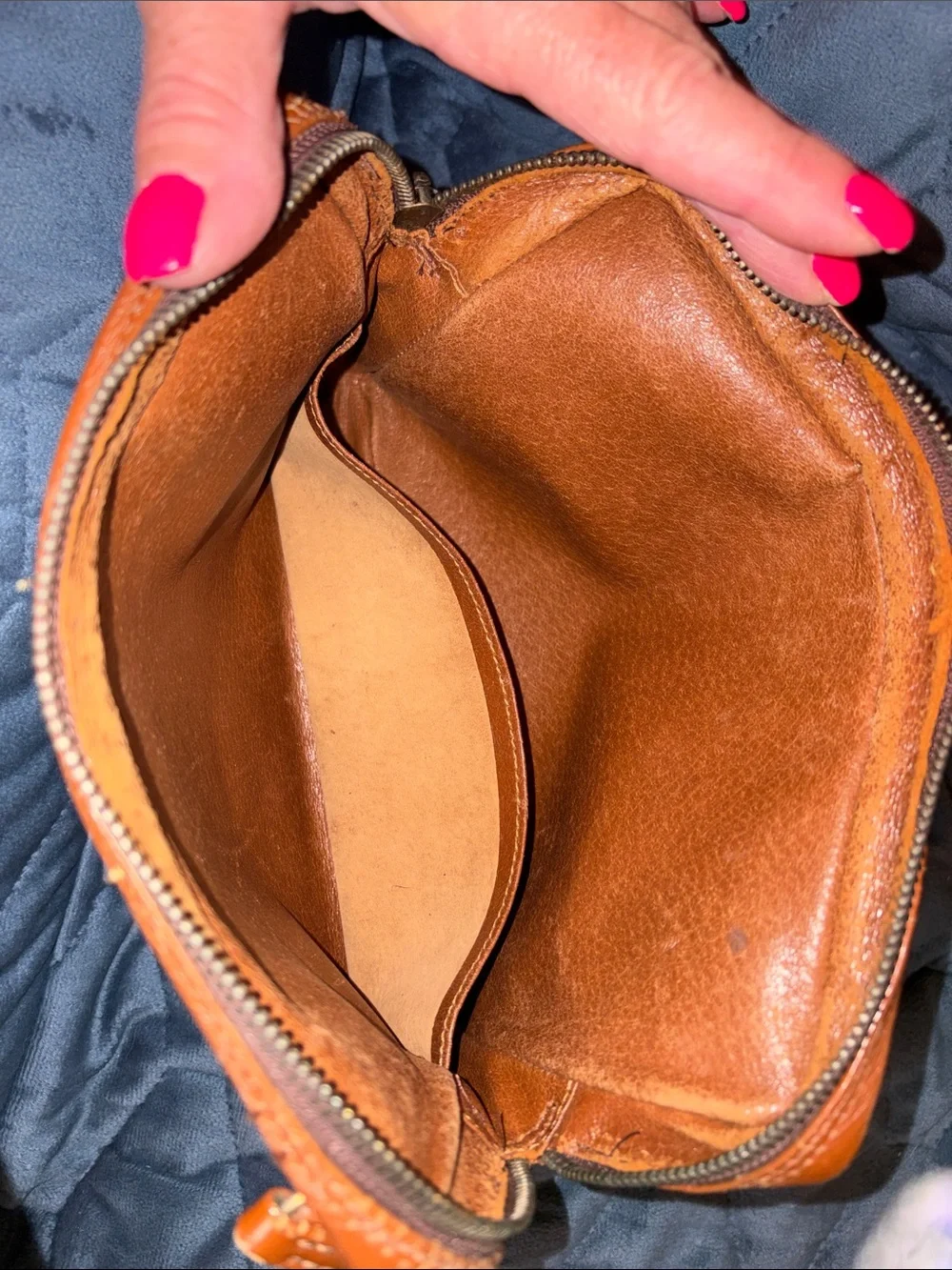 Louis Vuitton Brown Leather Monogram cosmetic case with wristlet strap.